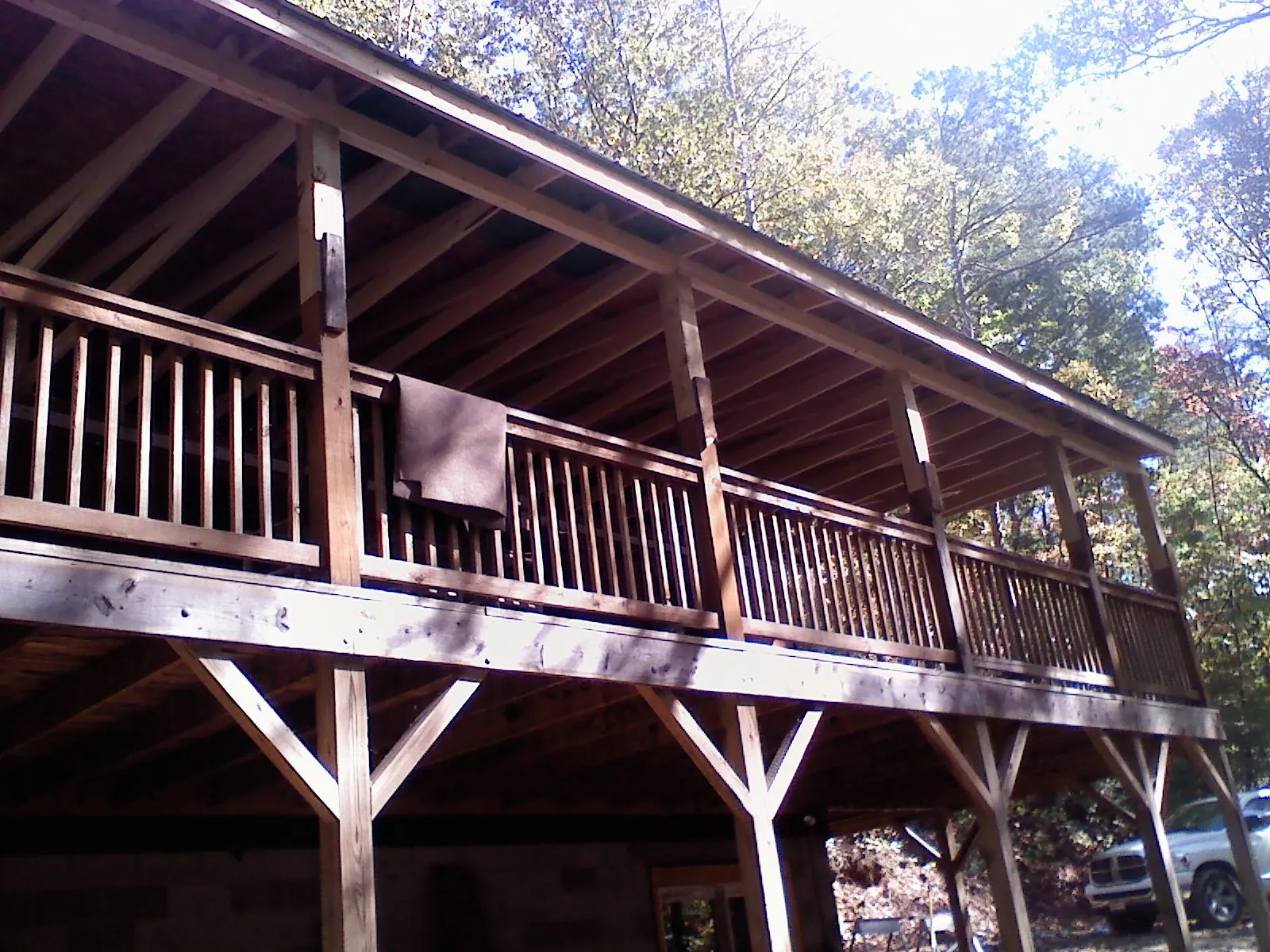 Timber framing under a new elevated porch and deck — Roof Leak Repair in Plainville by Roofing Brothers